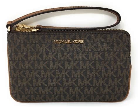 michael kors jet set charm large top zip wristlet|Michael Kors crossbody double zip.